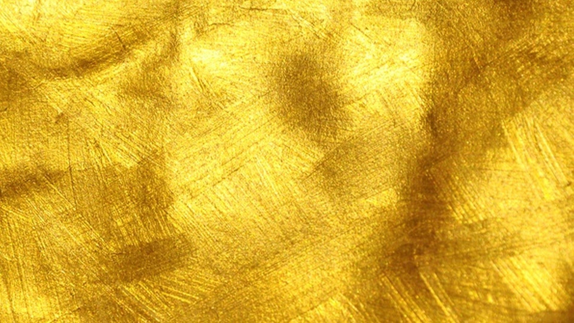 Textured metallic gold background.